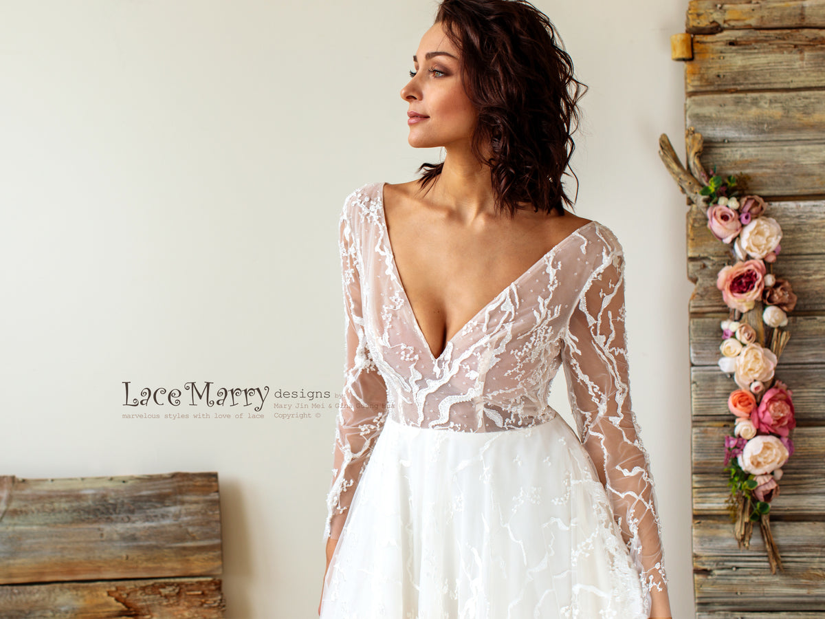 Sexy Wedding Dress with Deep Neckline and Long Sleeves