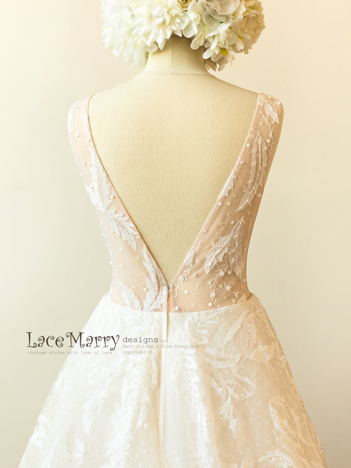 Blush Wedding Dress with Deep V Cut Back